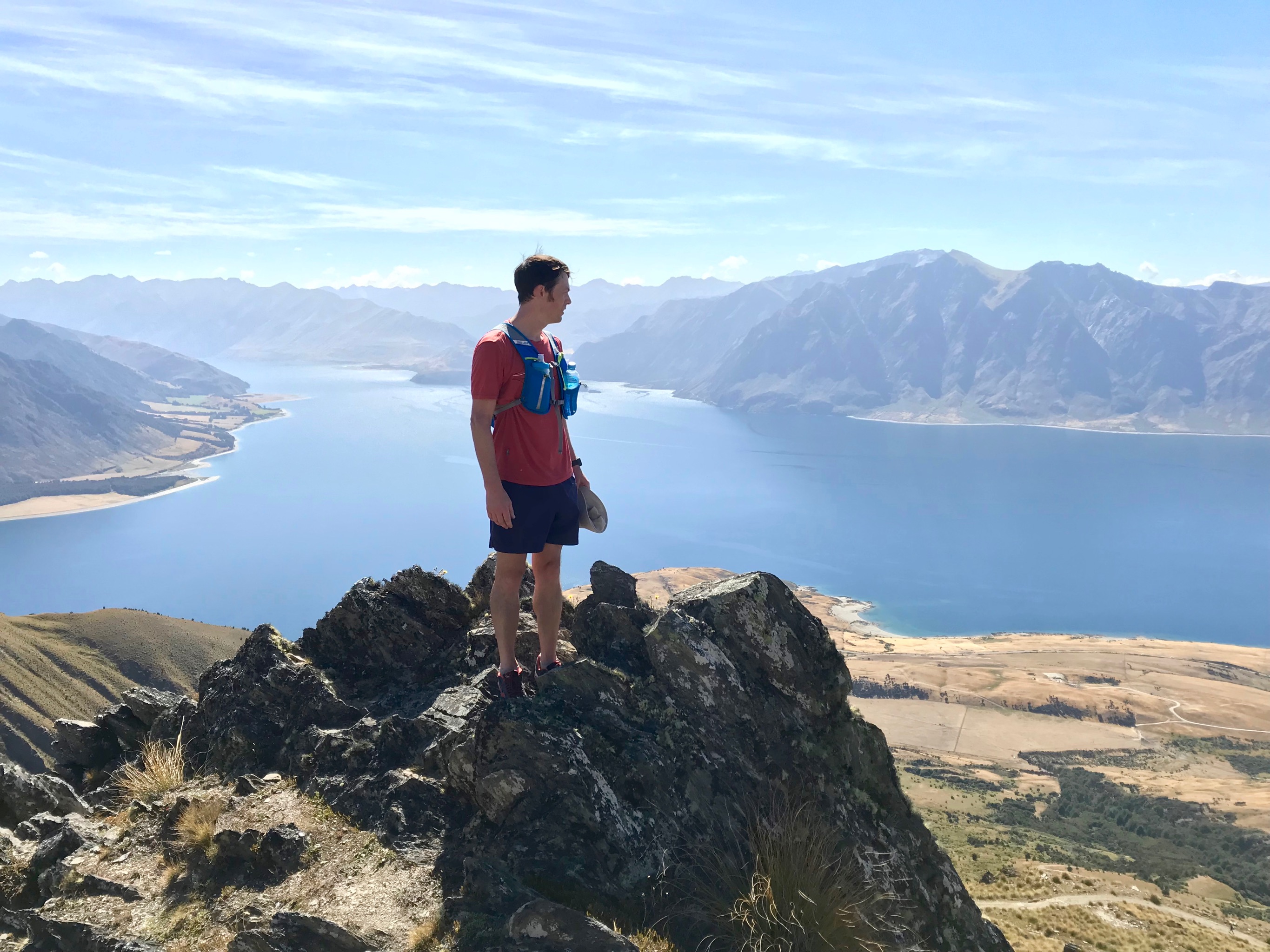 Me looking down over Lake Hawea on the way down the hill from our quick peak-bagging effort up to Isthmus Peak.