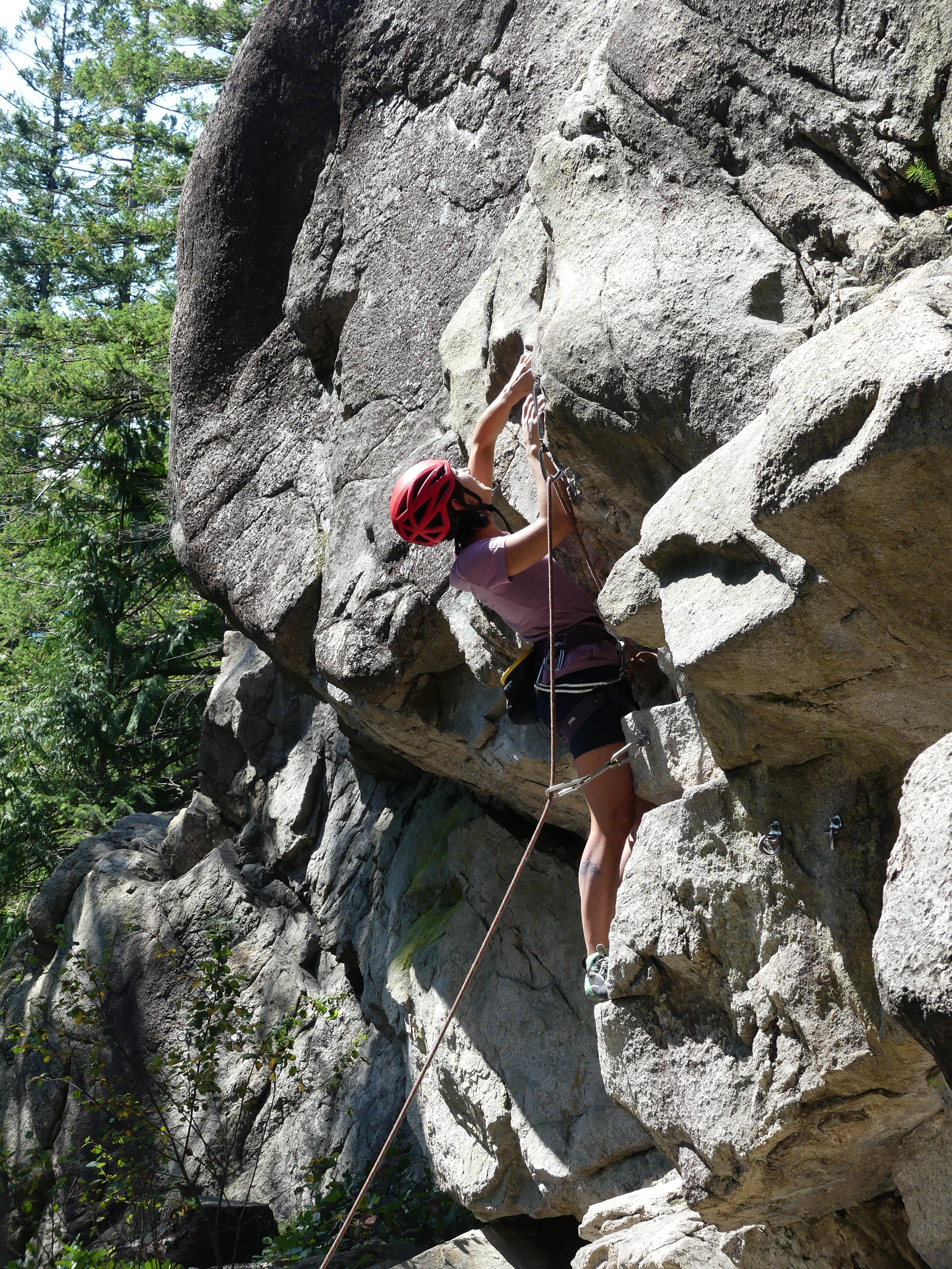 Alex on Double Overhang (grade 5.8) on the Woodstock wall at Murrin Park, Squamish.