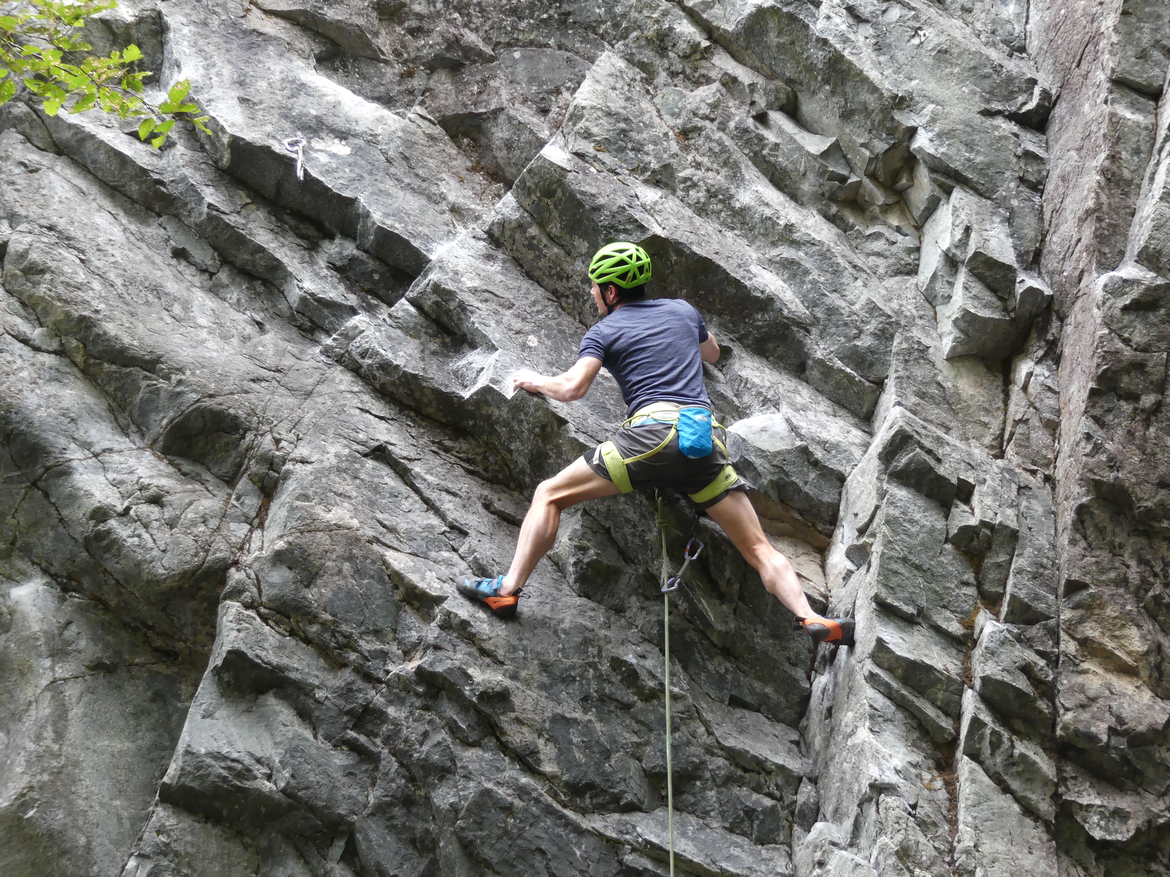 Alexei on his way to the fifth bolt on Creepy Crawlers (grade 5.11a) on the Forgotton Wall at Cheakamus Canyon.