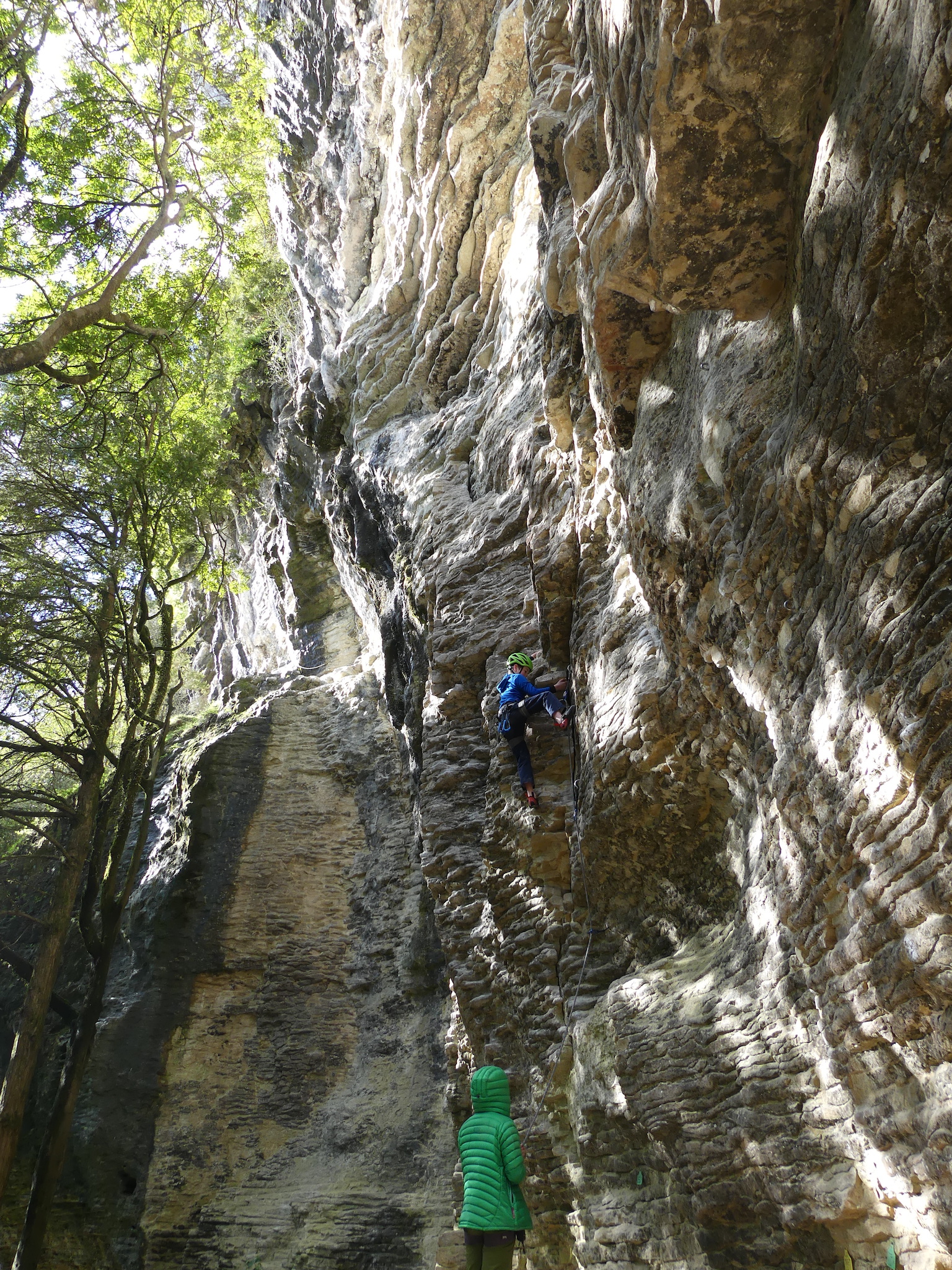 Aiden on his first ever lead climb, cruising 'French Ethics' (grade 15) in the Colosseum at Mangaokewa.