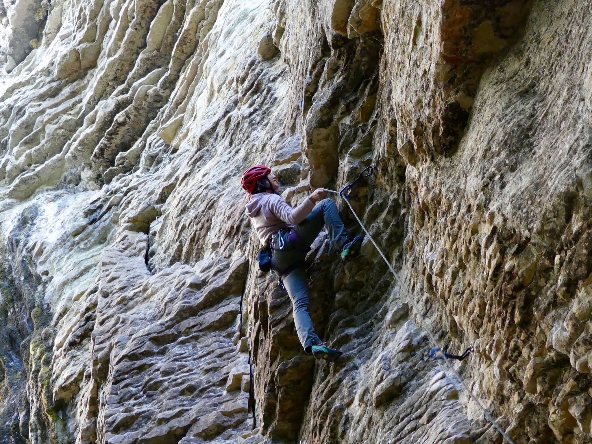 Alex about to clip the fourth bolt on Trojan Kat (grade 20) in the Colosseum at Mangaokewa