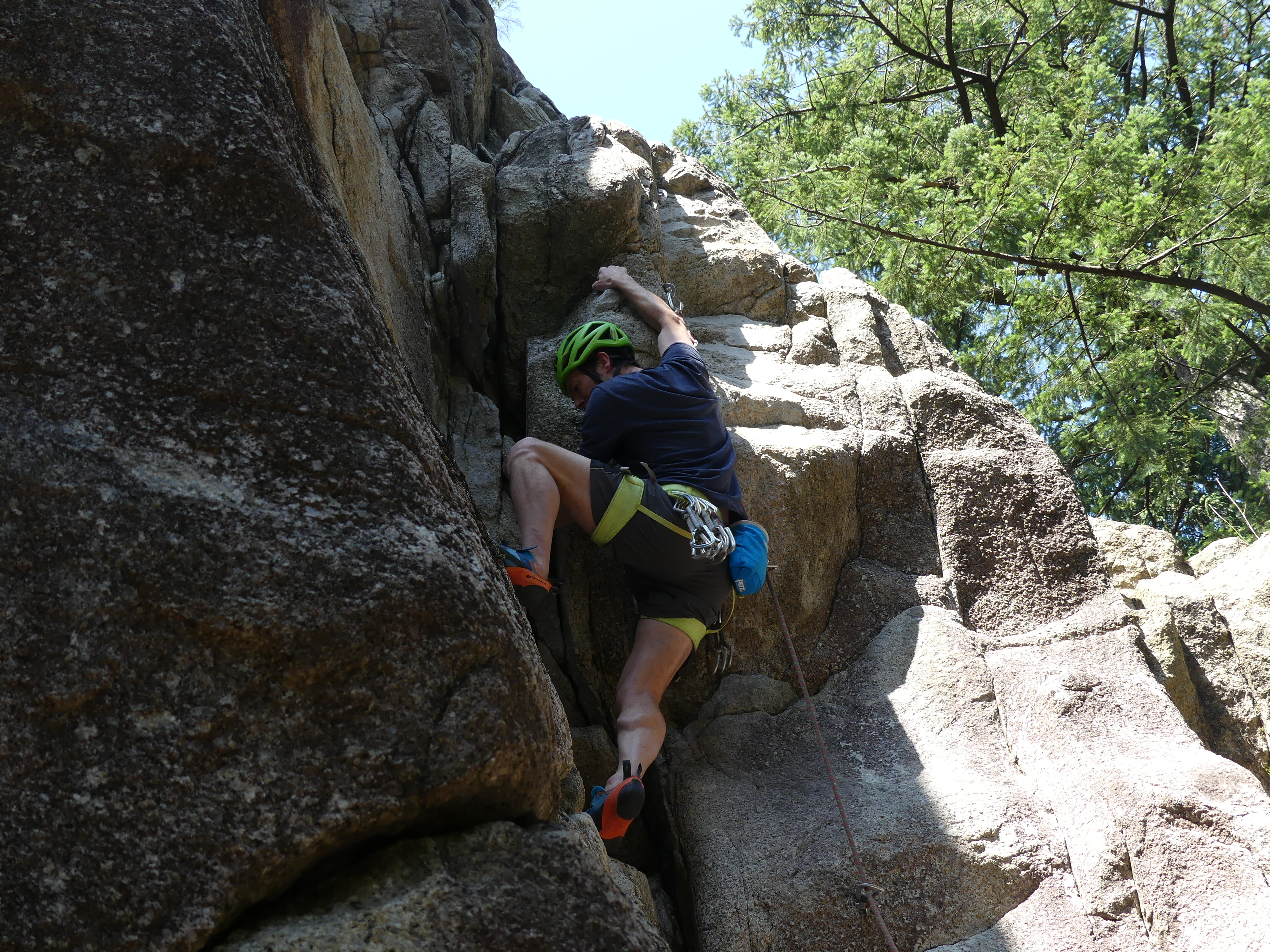 Alexei on Wavy Gravy (grade 5.10d) on Woodstock wall at Murrin Park, on his way to the redpoint (second attempt).